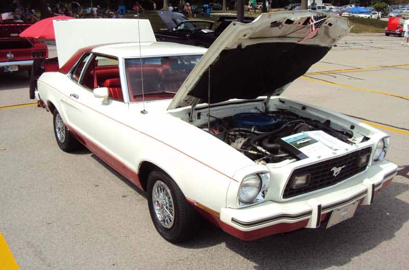 Mustang II in front of garage