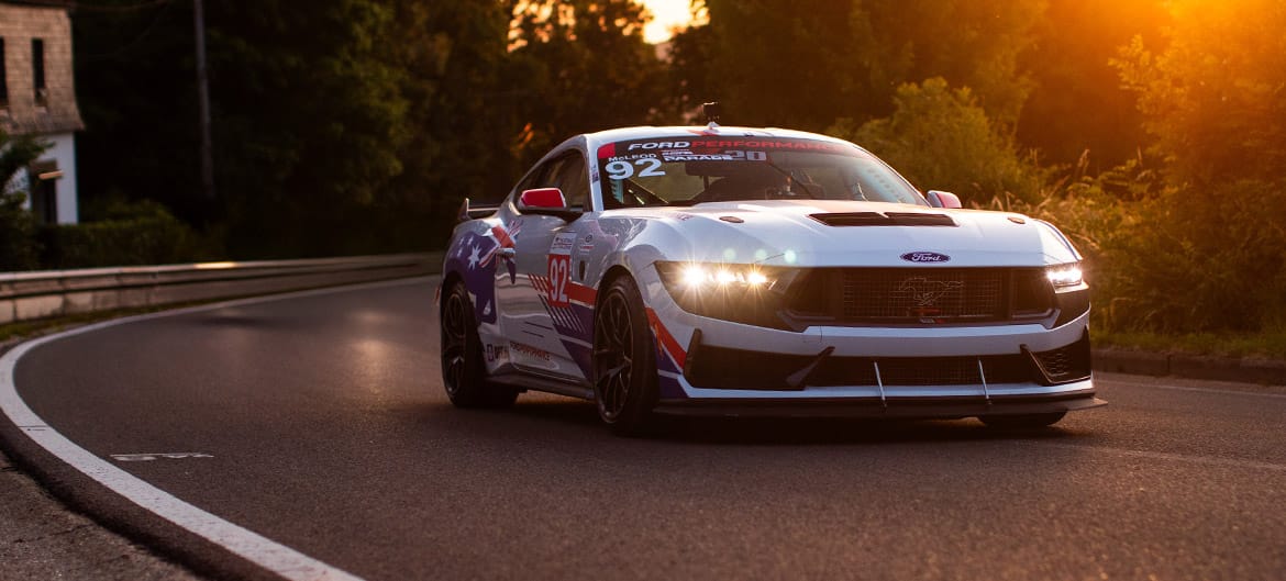 White Ford Mustang Dark Horse R during sunset