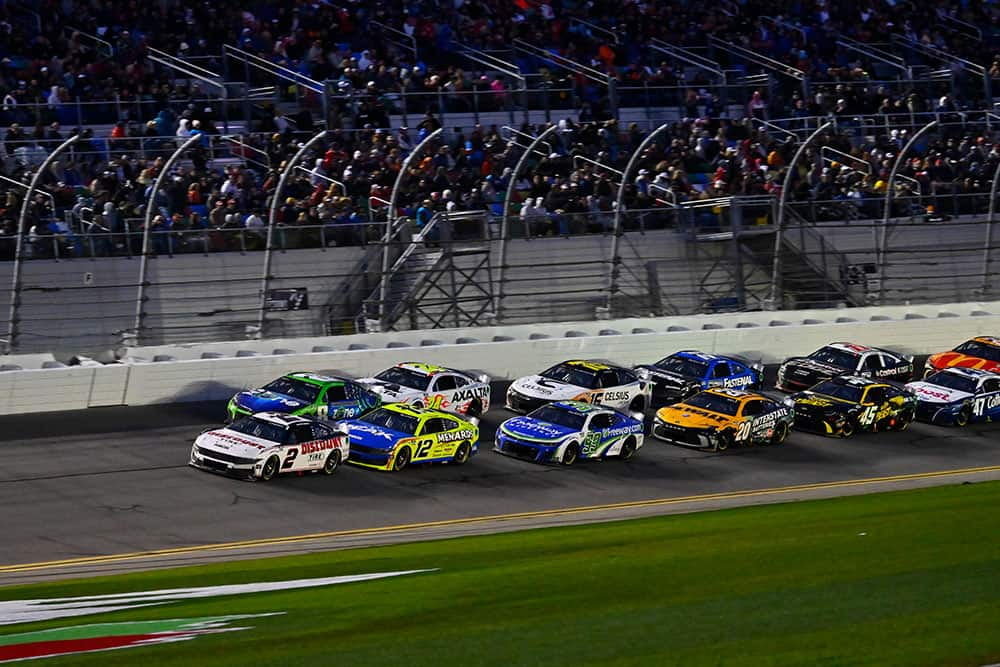 Multiple Stock Cars on a race track