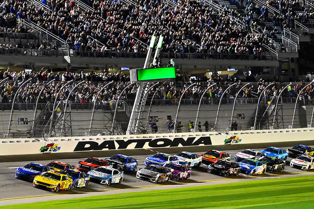 Multiple cars on Daytona race track 