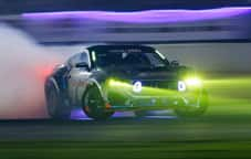 Mustang drifting at night on track 