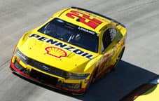 Logano Mustang on the track