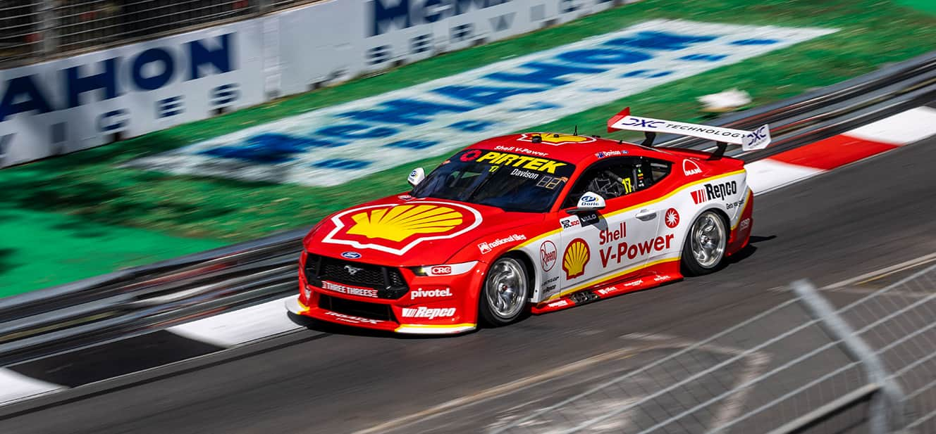 Will Davison’s red and yellow number 17 Ford Mustang Supercar race car on track