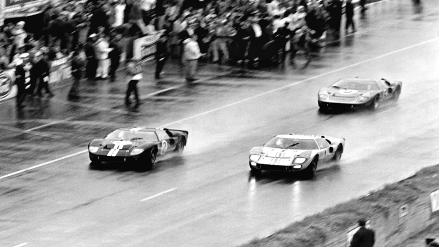 Archival image of cars on a racetrack