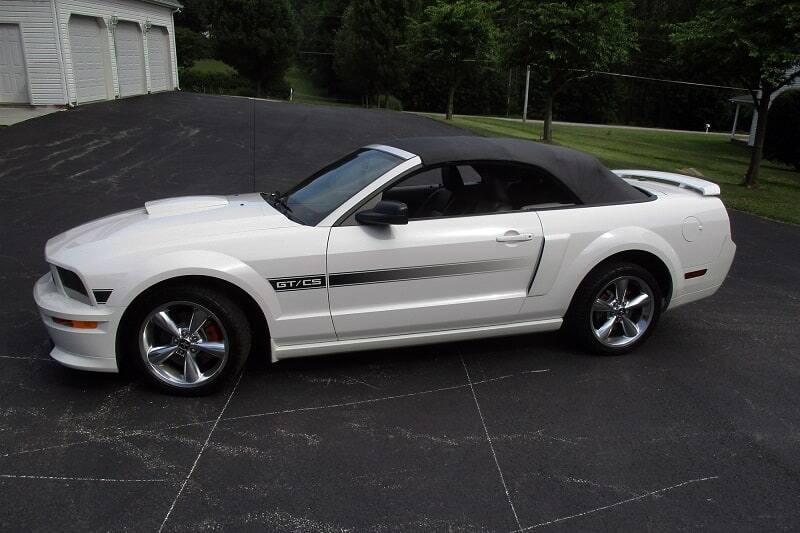 Driver's side view of 2007 Mustang GT/CS parked in front of garage