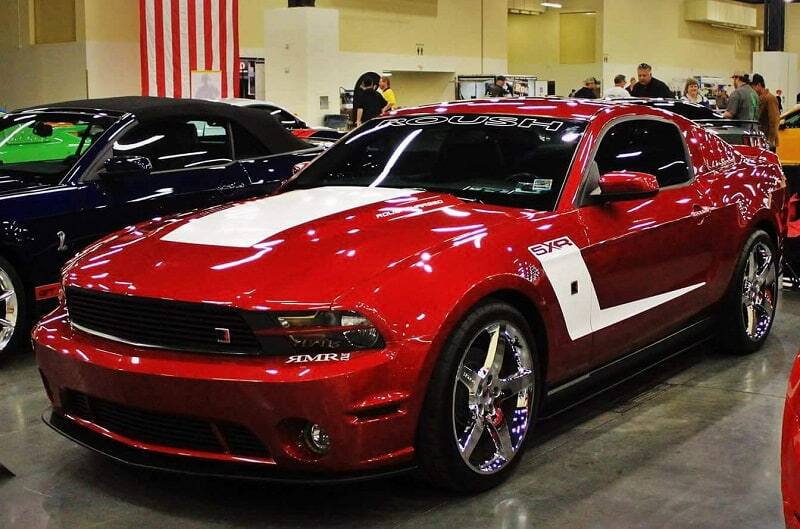 Front profile of 2015 Ruby Red 50th Anniversary Edition Mustang GT at car show
