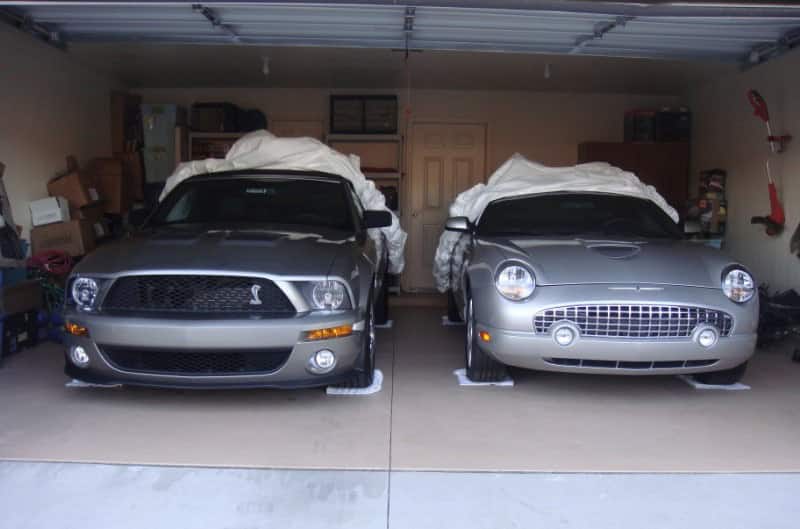 Front view of Joe's 2009 Shelby Mustang parked in garage next to his 2005 Thunderbird