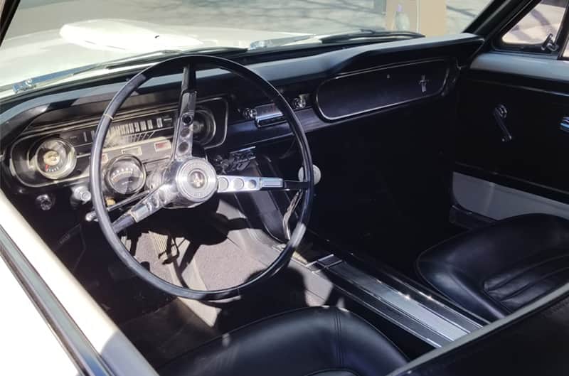 Interior photo of the dash inside of 1965 Mustang GT