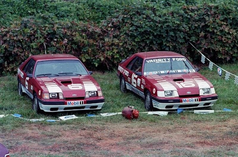 Specialty Mustang SVO race cars parked on lawn