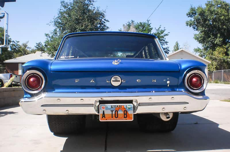 Rear of a blue Falcon in the driveway