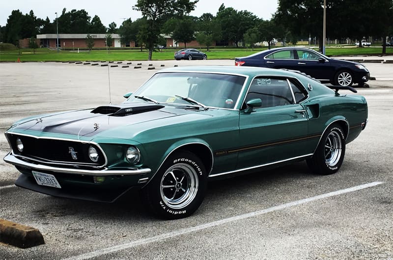 Front profile of green Mach 1 in parking lot