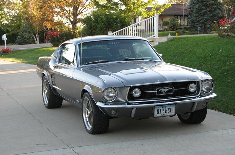 Front three quarter photo of silver mustang