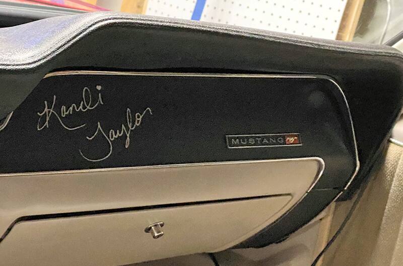 Kandi Taylor signature on dashboard