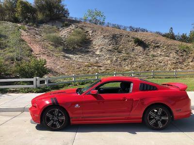 Side photo of Red S197 Mustang California Special