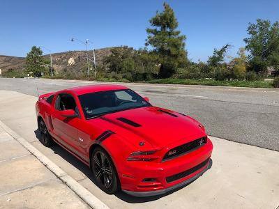 Photo of Red S197 GT/CS parked on street