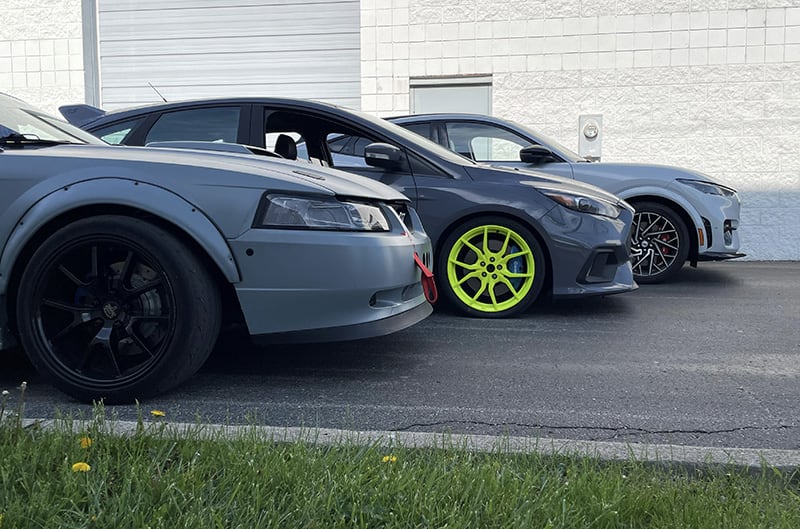 Mustang, Focus RS, and Mach E lined up