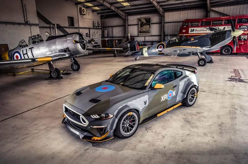 A full view of the Ford Eagle Squadron Mustang GT inside a garage with Eagle Squadron Spitfires