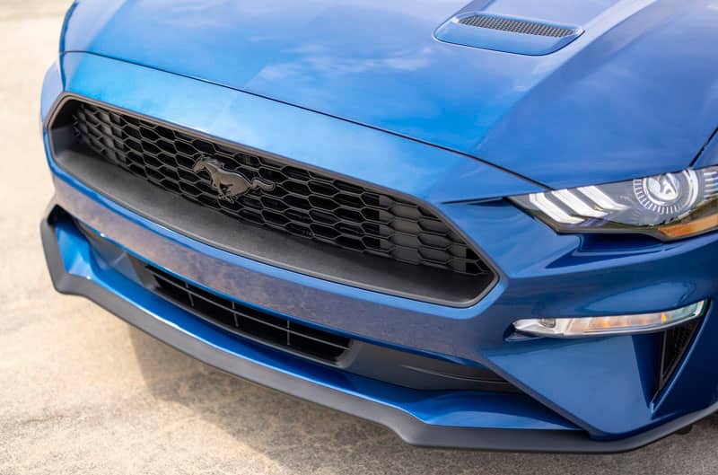 Close up front of the blue Mustang Stealth package