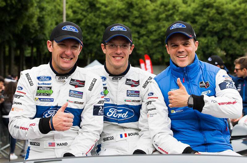 Three Ford GT drivers posing for camera