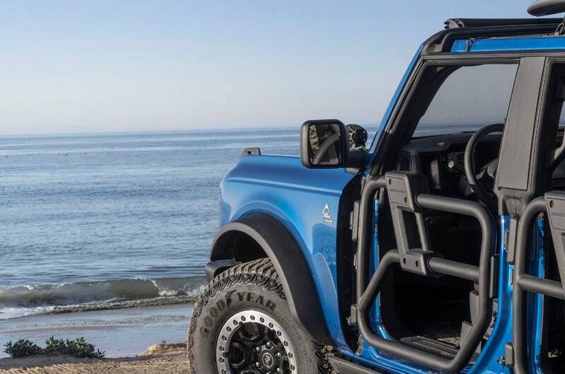 Close up front profile of blue Bronco Riptide on the beach