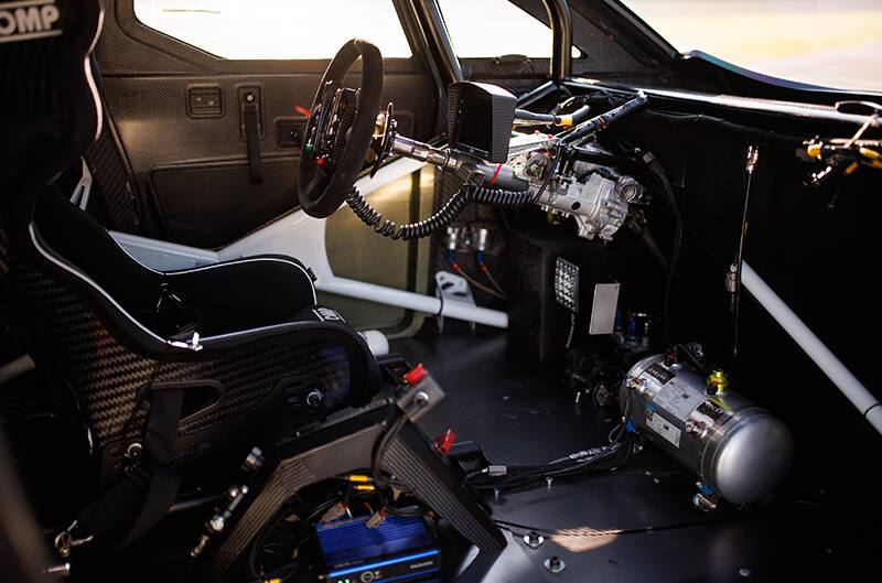 Interior photo of driver seat and cockpit