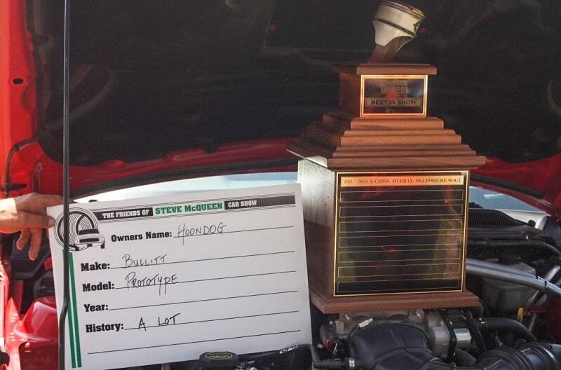 The 'Best of Show' trophy is pictured sitting on top of the Red Bullitt's engine