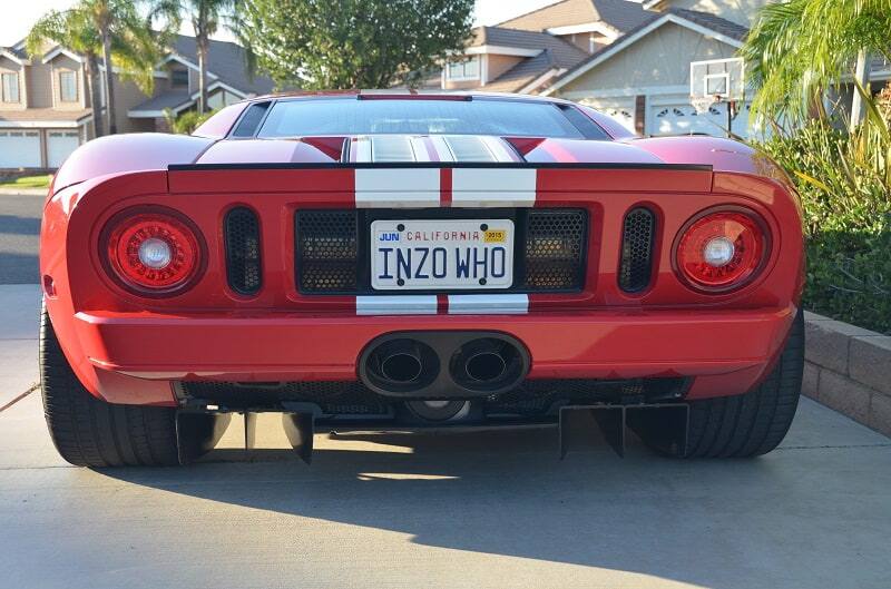 A rear end view of a red Ford GT