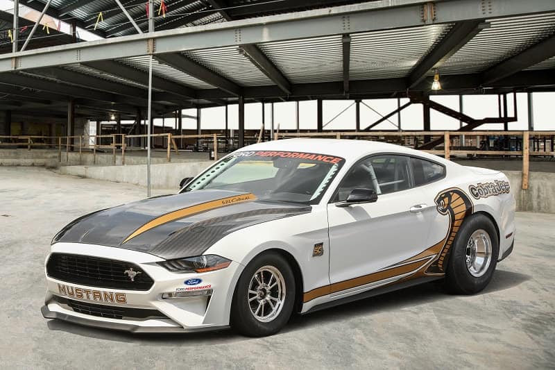 A side view of a white Ford Performance Mustang