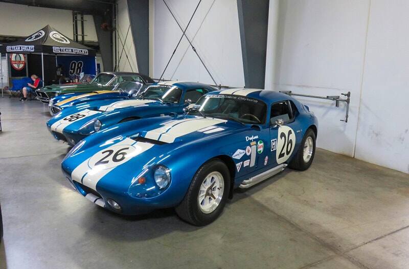 A blue and white Ford GT on display