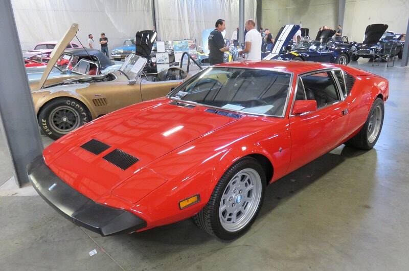 A classic red vehicle on display