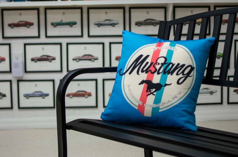 A closeup of a Ford Mustang pillow