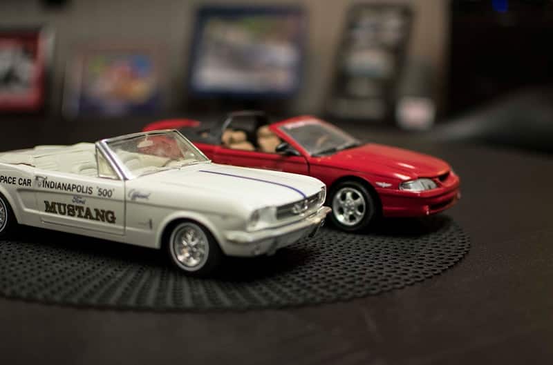 Classic and current toy Mustang cars