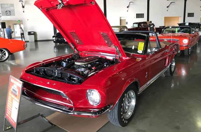 A red Shelby Mustang on display