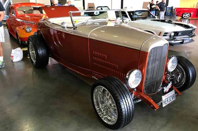 A front side view of a classic vehicle on display