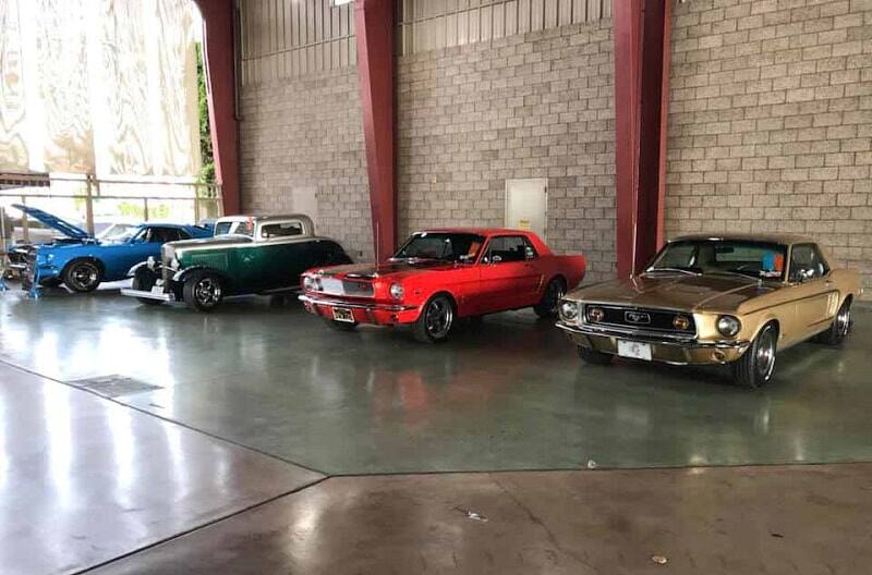 A lineup of classic Ford vehicles on display