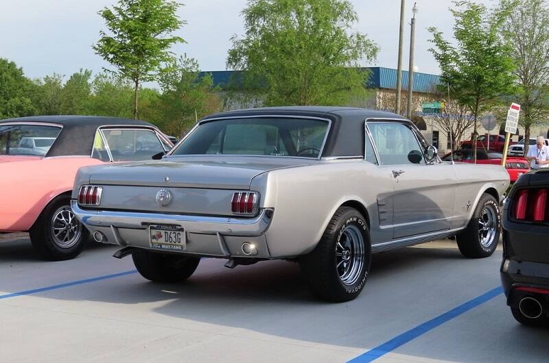 Rear of silver Mustang parked in parking spot