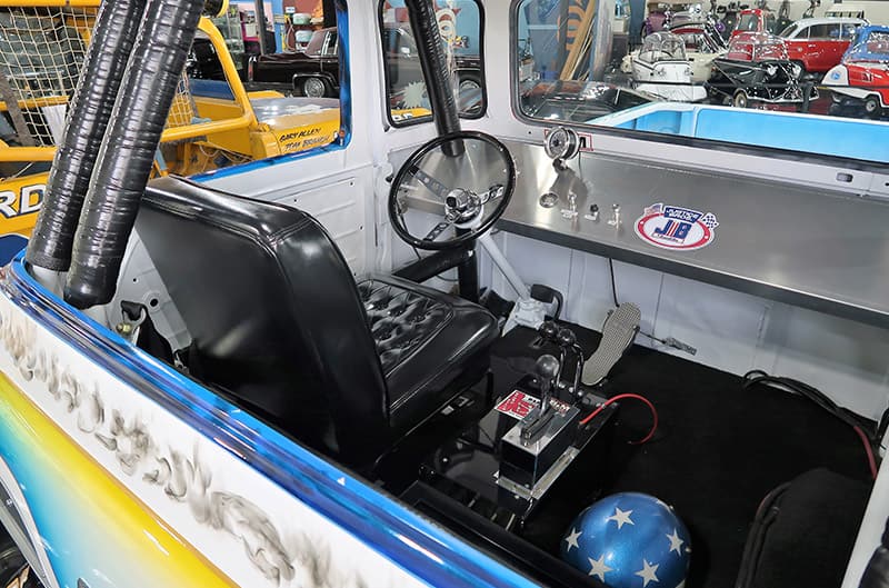 A closeup of the interior of a classic Ford truck