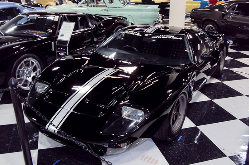 A front side view of a Ford GT on display at the museum