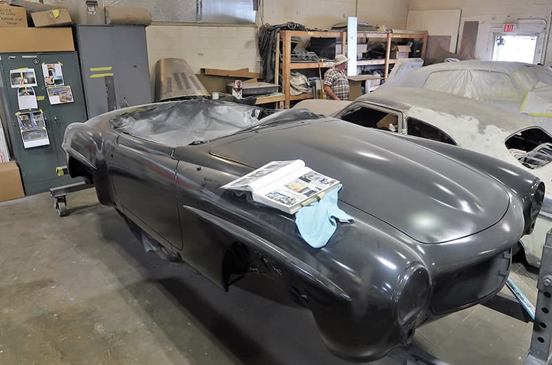 Front of a body of a black Shelby Cobra