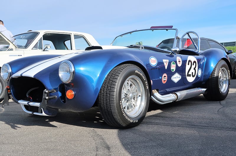 A classic blue vehicle on display