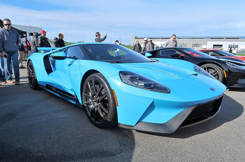 A front side view of a light blue Ford GT