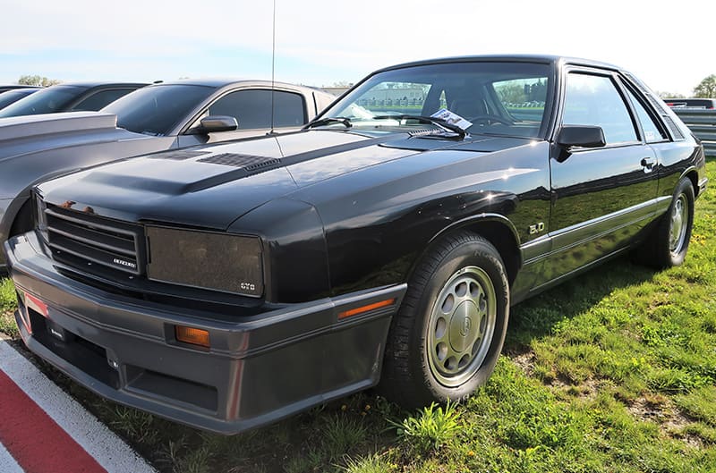 A black vehicle on display on display