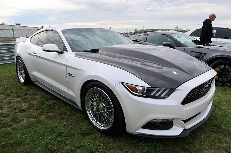 A front side view of a Mustang on display