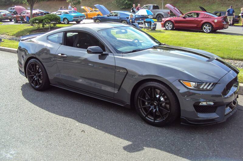 Profile of a gray Mustang in parking lot