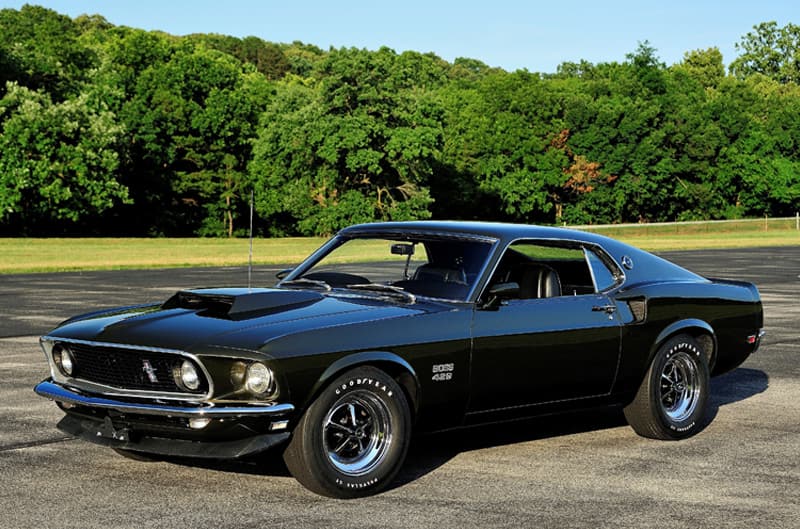 Front profile of black Mustang Boss 429 in parking lot