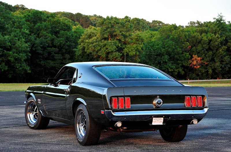 Rear of black Mustang Boss 429 in parking lot