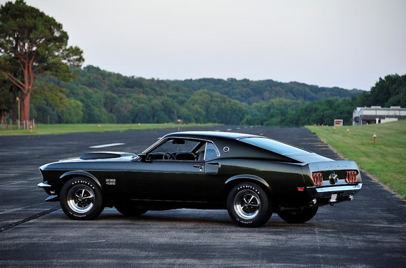 Profile of black Mustang Boss 429 in parking lot