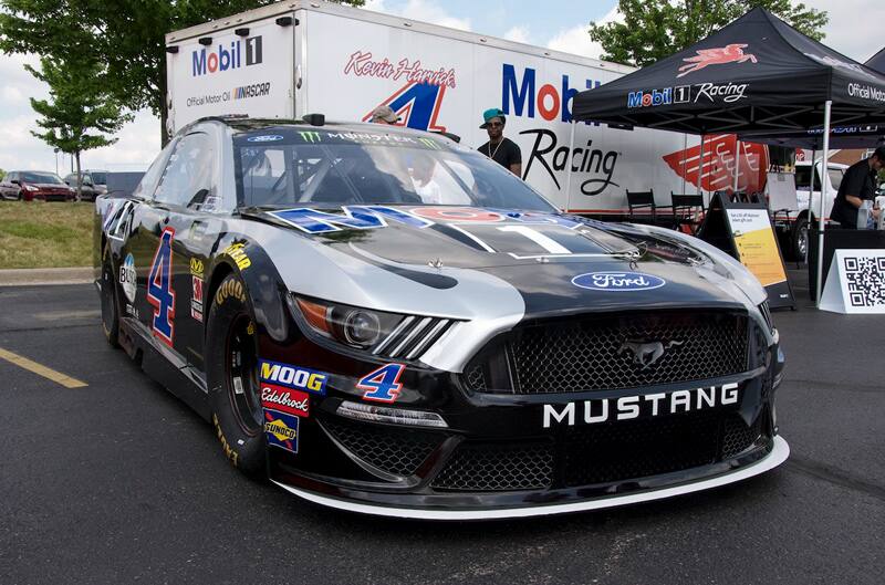 A front side view of Kevin Harvick's number 4 NASCAR Ford Mustang on display