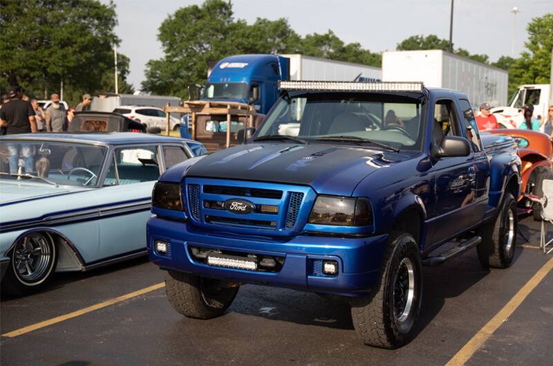 A blue Ford truck on display