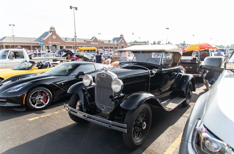 A classic black vehicle on display